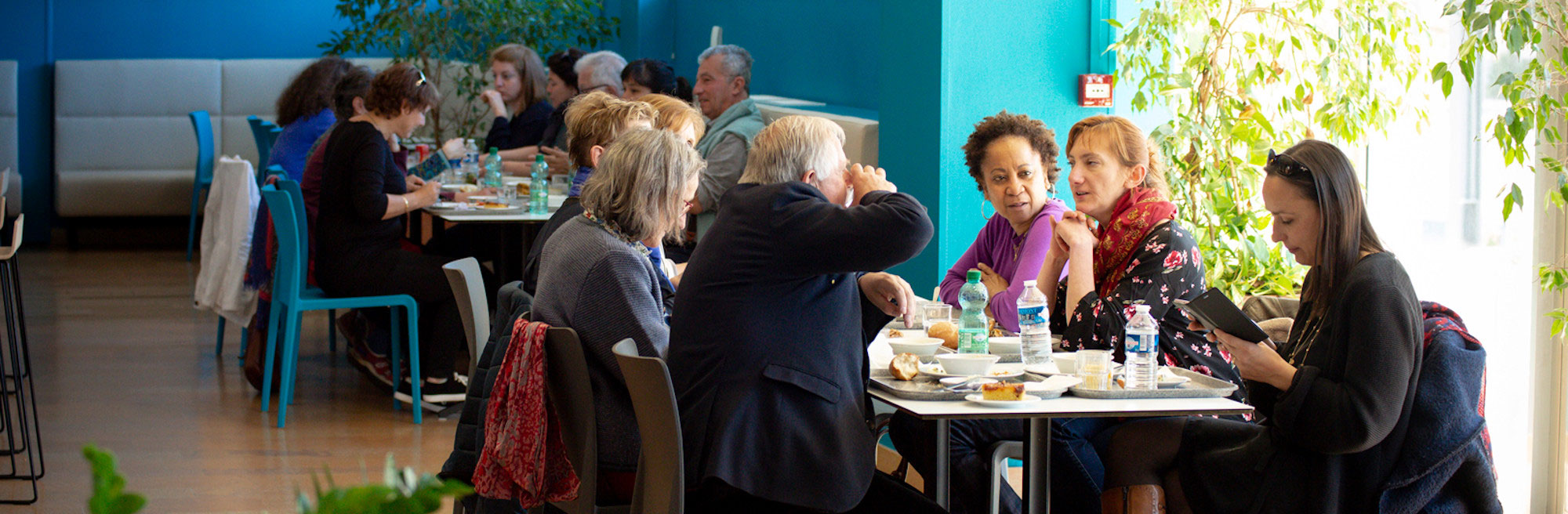 group of people eating at the self-service restaurant of the cisl